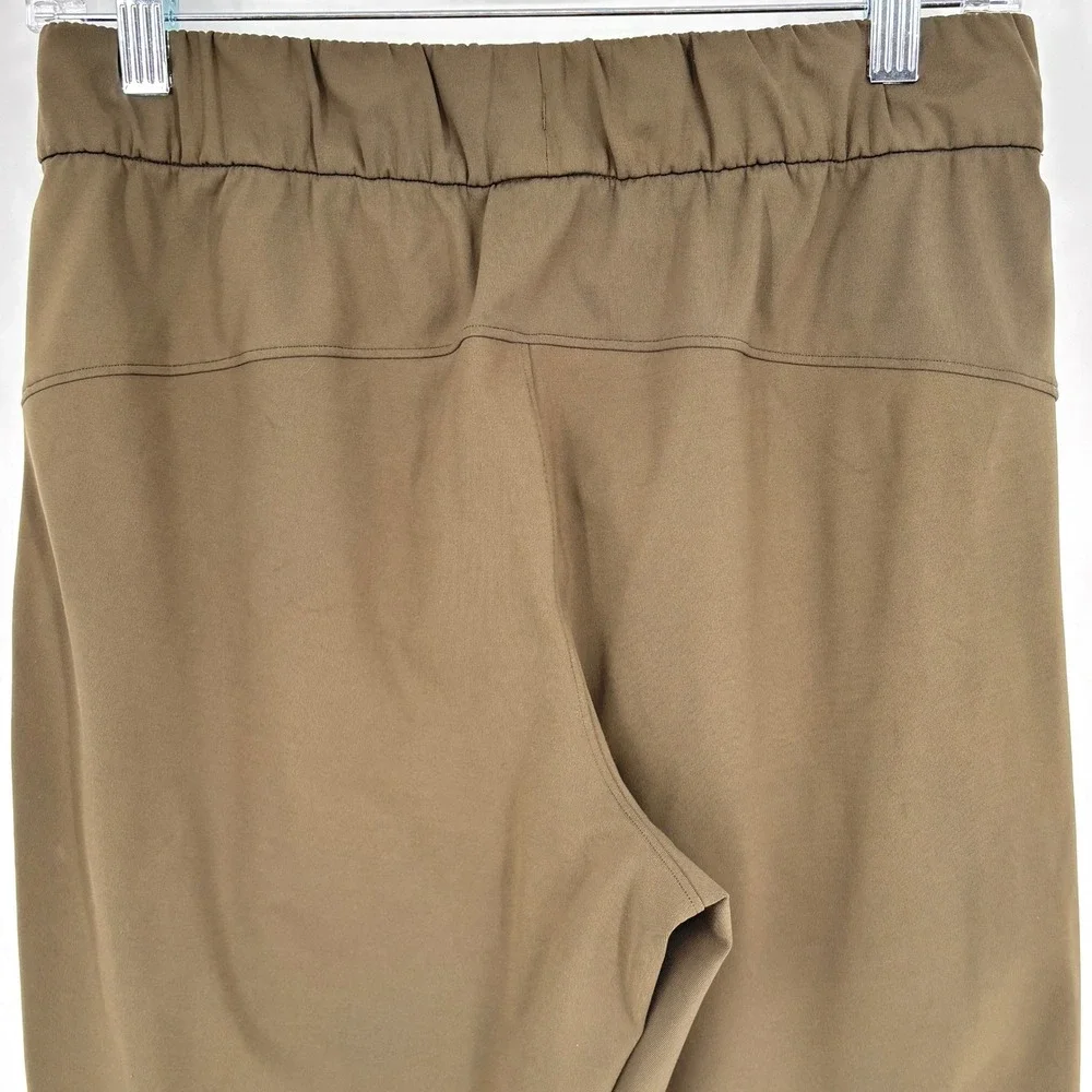 Lululemon‎ On The Fly Jogger 7/8 Mid Rise Olive Green Stretch Drawstring Size 6